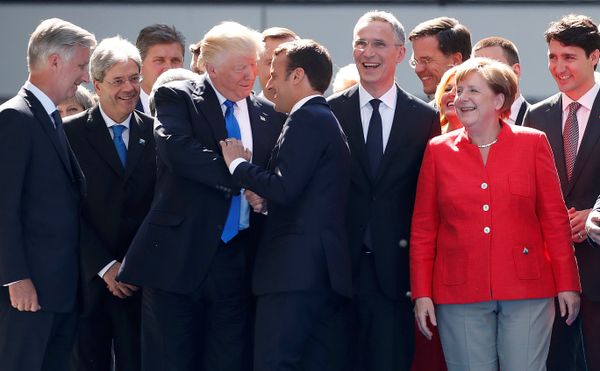 From L-R, Belgium's King Philipe, Italian Prime Minister Paolo Gentiloni, U.S. President Donald Trump who shakes hands with French President Emmanuel Macron, NATO Secretary General Jens Stoltenberg, Dutch Prime Minster Mark Rutte, German Chancellor Angela Merkel, and Canada's Prime Minister Justin Trudeau gather with NATO member leaders to pose for a family picture before the start of their summit in Brussels, Belgium, May 25, 2017 From L-R, Belgium's King Philipe, Italian Prime Minister Paolo Gentiloni, U.S. President Donald Trump who shakes hands with French President Emmanuel Macron, NATO Secretary General Jens Stoltenberg, Dutch Prime Minster Mark Rutte, German Chancellor Angela Merkel, and Canada's Prime Minister Justin Trudeau gather with NATO member leaders to pose for a family picture before the start of their summit in Brussels, Belgium, May 25, 2017 - Sputnik International