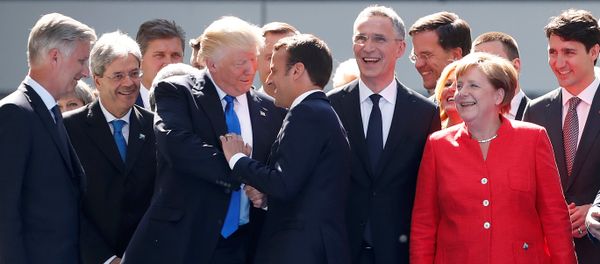 From L-R, Belgium's King Philipe, Italian Prime Minister Paolo Gentiloni, U.S. President Donald Trump who shakes hands with French President Emmanuel Macron, NATO Secretary General Jens Stoltenberg, Dutch Prime Minster Mark Rutte, German Chancellor Angela Merkel, and Canada's Prime Minister Justin Trudeau gather with NATO member leaders to pose for a family picture before the start of their summit in Brussels, Belgium, May 25, 2017 From L-R, Belgium's King Philipe, Italian Prime Minister Paolo Gentiloni, U.S. President Donald Trump who shakes hands with French President Emmanuel Macron, NATO Secretary General Jens Stoltenberg, Dutch Prime Minster Mark Rutte, German Chancellor Angela Merkel, and Canada's Prime Minister Justin Trudeau gather with NATO member leaders to pose for a family picture before the start of their summit in Brussels, Belgium, May 25, 2017 - Sputnik International