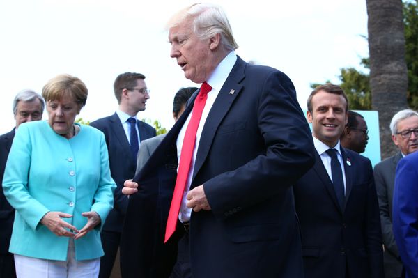 German Chancellor Angela Merkel, U.S. President Donald Trump and French President Emmanuel Macron during a family photo at the G7 Summit expanded session in Taormina, Sicily, Italy, May 27, 2017 German Chancellor Angela Merkel, U.S. President Donald Trump and French President Emmanuel Macron during a family photo at the G7 Summit expanded session in Taormina, Sicily, Italy, May 27, 2017 - Sputnik International