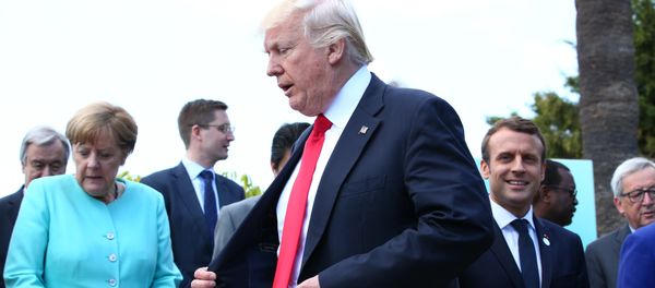 German Chancellor Angela Merkel, U.S. President Donald Trump and French President Emmanuel Macron during a family photo at the G7 Summit expanded session in Taormina, Sicily, Italy, May 27, 2017 - Sputnik International