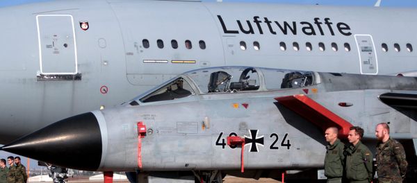 German airmen stand next to a fighter jet and a transport plane after the US Defense Secretary Ash Carter visited the Incirlik Air Base near Adana, Turkey, Tuesday, Dec. 15, 2015 German airmen stand next to a fighter jet and a transport plane after the US Defense Secretary Ash Carter visited the Incirlik Air Base near Adana, Turkey, Tuesday, Dec. 15, 2015 - Sputnik International