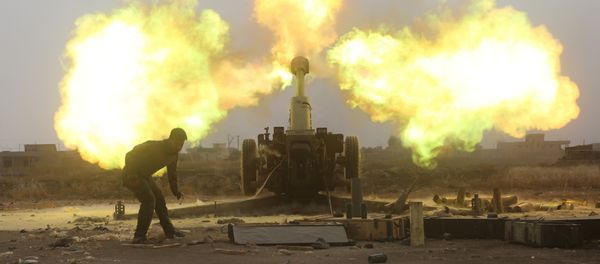 Popular Mobilization Forces (PMF) fire towards Islamic State militants during a battle on the outskirts of Al-Ba'aj, west of Mosul, Iraq May 26, 2017 Popular Mobilization Forces (PMF) fire towards Islamic State militants during a battle on the outskirts of Al-Ba'aj, west of Mosul, Iraq May 26, 2017 - Sputnik International