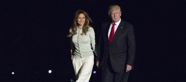 President Donald Trump and first lady Melania Trump walk from Marine One across the South Lawn to White House in Washington, Saturday, May 27, 2017, as they return from Sigonella, Italy - Sputnik International