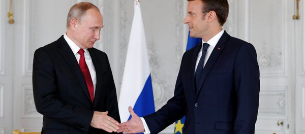 French President Emmanuel Macron shakes hands Russian President Vladimir Putin (L) at the Chateau de Versailles as they meet for talks before the opening of an exhibition marking 300 years of diplomatic ties between the two countyies in Versailles, France, May 29, 2017 French President Emmanuel Macron shakes hands Russian President Vladimir Putin (L) at the Chateau de Versailles as they meet for talks before the opening of an exhibition marking 300 years of diplomatic ties between the two countyies in Versailles, France, May 29, 2017 - Sputnik International