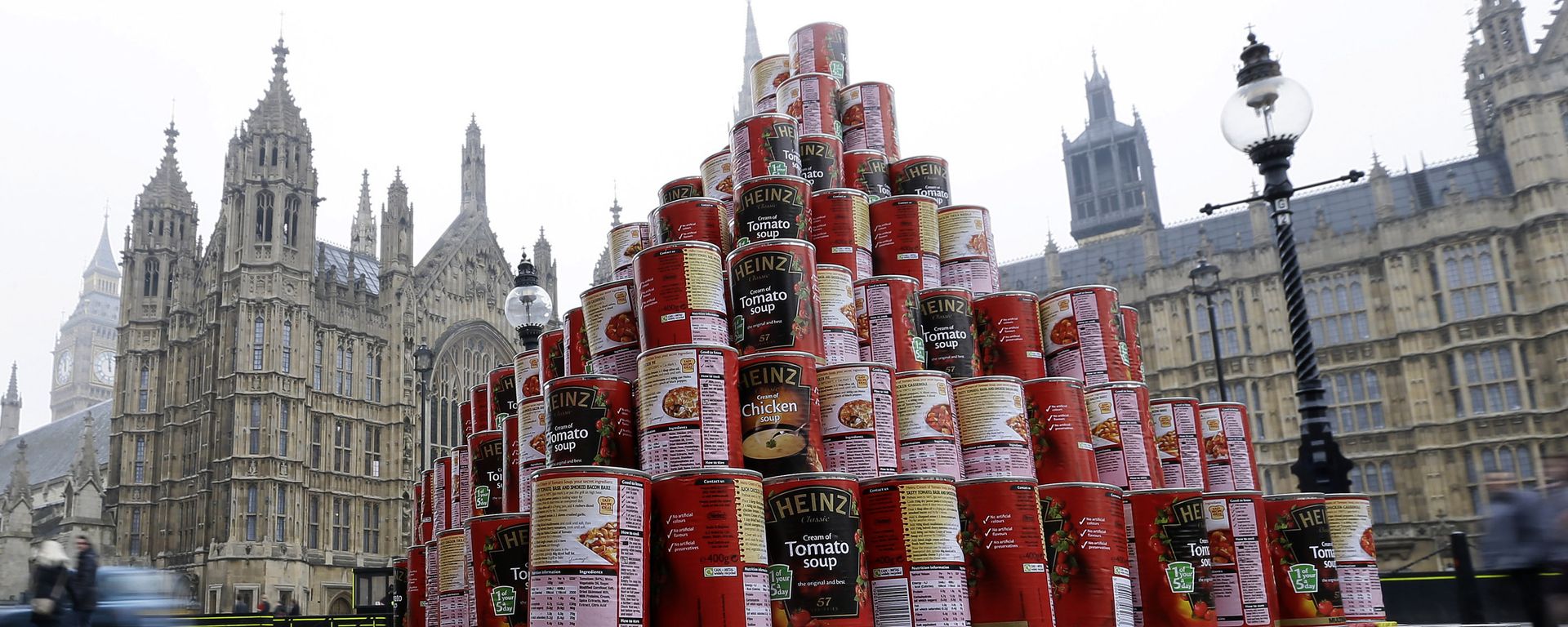 A pyramid of 468 cans of soup during a media event outside the Palace of Westminster to highlight food bank dependency. A pyramid of 468 cans of soup during a media event outside the Palace of Westminster to highlight food bank dependency. - Sputnik International, 1920, 31.08.2022