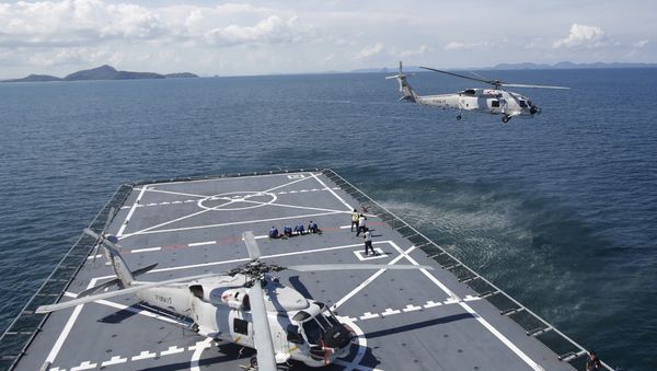 (File) A helicopter takes off from HTMS Angthonga helipad before a patrol demonstration to the media on a Thai naval ship in Phuket province Friday, May 29, 2015 (File) A helicopter takes off from HTMS Angthonga helipad before a patrol demonstration to the media on a Thai naval ship in Phuket province Friday, May 29, 2015 - Sputnik International