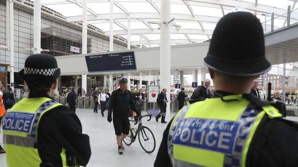 Police watch as commuters pass through Manchester Victoria railway station in Manchester England, which has reopened for the first time since the terror attack on the adjacent Manchester Arena Tuesday May 30, 2017 Police watch as commuters pass through Manchester Victoria railway station in Manchester England, which has reopened for the first time since the terror attack on the adjacent Manchester Arena Tuesday May 30, 2017 - Sputnik International