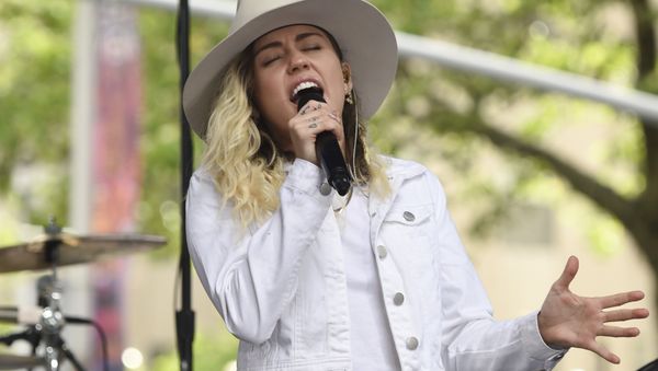 FILE - In this May 26, 2017 file photo, singer Miley Cyrus performs on NBC's Today show in New York. Cyrus will join Ariana Grande at a charity concert called One Love Manchester in Manchester, England, Sunday, June 3, 2017, two weeks after a bomber killed 22 people at Grande's concert in Manchester - Sputnik International
