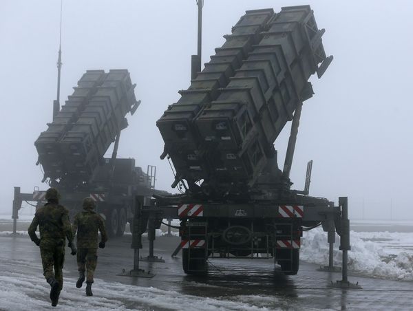 Two soldiers run toward Patriot antimissile systems. File photo Two soldiers run toward Patriot antimissile systems. File photo - Sputnik International