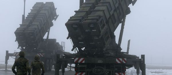 Two soldiers run toward Patriot antimissile systems. File photo Two soldiers run toward Patriot antimissile systems. File photo - Sputnik International