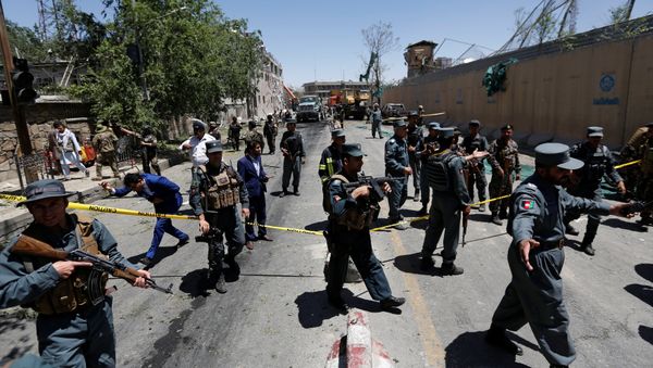 Afghan policemen inspect at the site of a blast in Kabul, Afghanistan May 31, 2017 Afghan policemen inspect at the site of a blast in Kabul, Afghanistan May 31, 2017 - Sputnik International