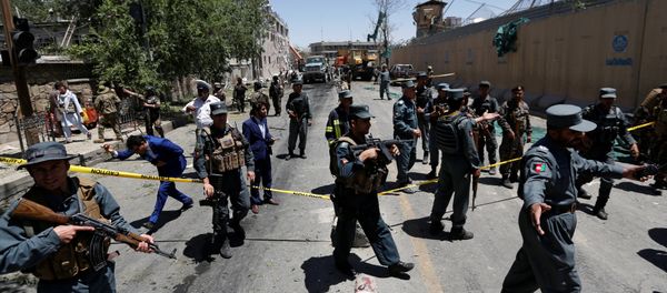 Afghan policemen inspect at the site of a blast in Kabul, Afghanistan May 31, 2017 - Sputnik International