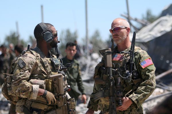 US forces are seen at the Kurdish People's Protection Units (YPG) headquarters after it was hit by Turkish airstrikes in Mount Karachok near Malikiya, Syria April 25, 2017. - Sputnik International