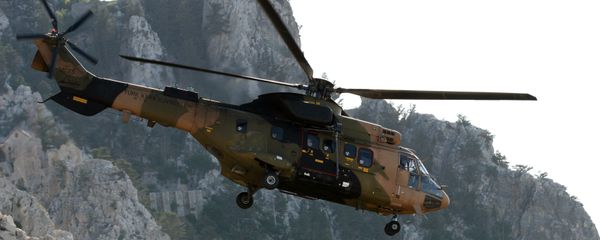 A Turkish army Cougar helicopter flies over the Saint-Hilarion mountain shane near Kyrenia during a search and rescue exercise in northern Cyprus, Tuesday, June 16, 2009 amid a dispute with Greek Cypriots over oil and gas exploration off the island. A Turkish army Cougar helicopter flies over the Saint-Hilarion mountain shane near Kyrenia during a search and rescue exercise in northern Cyprus, Tuesday, June 16, 2009 amid a dispute with Greek Cypriots over oil and gas exploration off the island. - Sputnik International