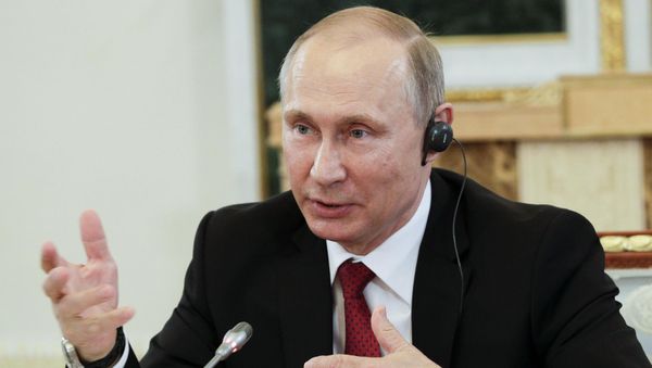 Russian President Vladimir Putin speaks during a meeting with representatives of international news agencies in St. Petersburg, Russia, June 1, 2017. Russian President Vladimir Putin speaks during a meeting with representatives of international news agencies in St. Petersburg, Russia, June 1, 2017. - Sputnik International