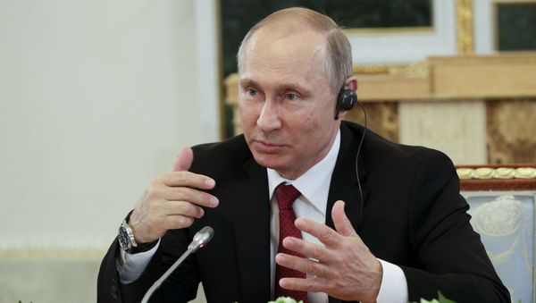 Russian President Vladimir Putin speaks during a meeting with representatives of international news agencies in St. Petersburg, Russia, June 1, 2017. Russian President Vladimir Putin speaks during a meeting with representatives of international news agencies in St. Petersburg, Russia, June 1, 2017. - Sputnik International