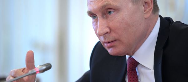Russian President Vladimir Putin speaks during a meeting with representatives of international news agencies in St. Petersburg, Russia Russian President Vladimir Putin speaks during a meeting with representatives of international news agencies in St. Petersburg, Russia - Sputnik International