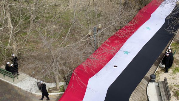 Druse participate in a rally, demanding the return of the Golan Heights, captured by Israel in 1967, close to the Syrian border in Buqata in the Golan Heights, Sunday, Feb. 14, 2016. - Sputnik International