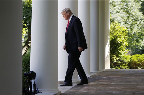 U.S. President Donald Trump enters the Rose Garden from the White House colonnade to announce his decision to leave the Paris Climate Agreement in the Rose Garden of the White House in Washington, U.S., JJune 1, 2017 - Sputnik International