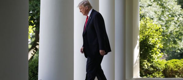 U.S. President Donald Trump enters the Rose Garden from the White House colonnade to announce his decision to leave the Paris Climate Agreement in the Rose Garden of the White House in Washington, U.S., JJune 1, 2017 U.S. President Donald Trump enters the Rose Garden from the White House colonnade to announce his decision to leave the Paris Climate Agreement in the Rose Garden of the White House in Washington, U.S., JJune 1, 2017 - Sputnik International