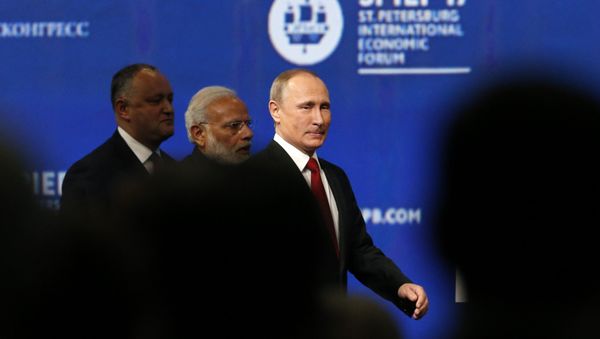(R-L) Russian President Vladimir Putin, Indian Prime Minister Narendra Modi and Moldovan President Igor Dodon attend a session of the St. Petersburg International Economic Forum (SPIEF), Russia, June 2, 2017. - Sputnik International