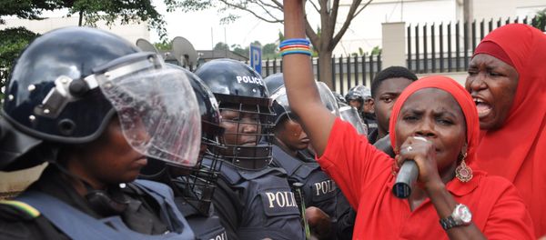 Police women in riot gear block the route during a demonstration calling on the government to rescue the kidnapped girls of the government secondary school in Chibok, in Abuja, Nigeria, Tuesday, Oct. 14, 2014. - Sputnik International