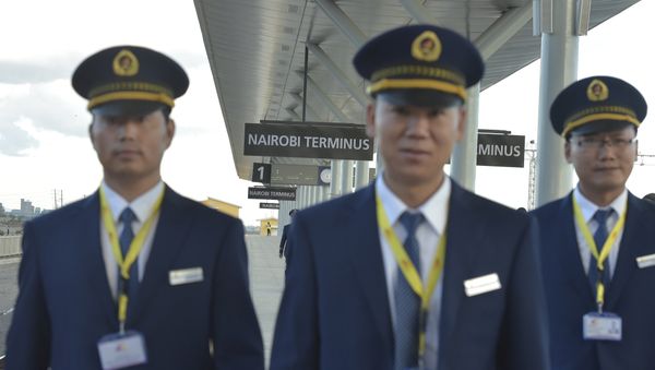 Kenya Railways attendants from China upon arrival from Mombasa in a train launched to operate on the Standard Gauge Railway (SGR) on May 31, 2017 in Nairobi. - Sputnik International