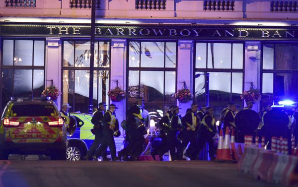 Police Officers walking on Borough High Street as police are dealing with an incident on London Bridge in London, Saturday, June 3, 2017. - Sputnik International