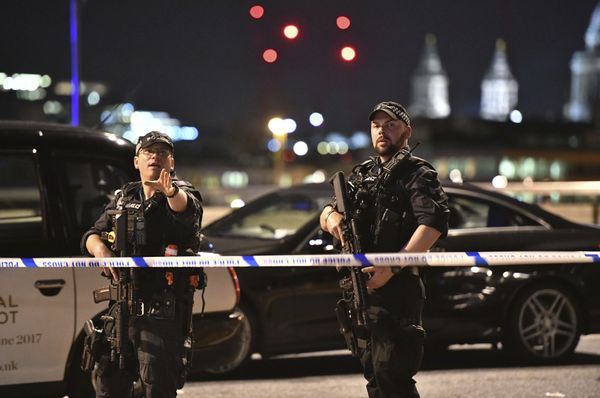 Armed Police officers stand guard on London Bridge in central London, Saturday, June 3, 2017. Armed Police officers stand guard on London Bridge in central London, Saturday, June 3, 2017. - Sputnik International