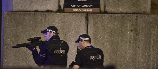 An armed Police officer looks through his weapon on London Bridge in London, Saturday, June 3, 2017. An armed Police officer looks through his weapon on London Bridge in London, Saturday, June 3, 2017. - Sputnik International