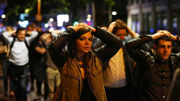People leave the area with their hands up after an incident near London Bridge in London, Britain June 4, 2017 People leave the area with their hands up after an incident near London Bridge in London, Britain June 4, 2017 - Sputnik International