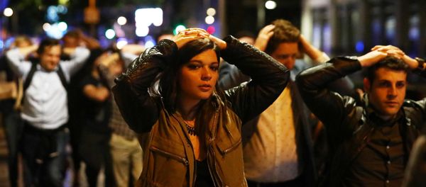 People leave the area with their hands up after an incident near London Bridge in London, Britain June 4, 2017 People leave the area with their hands up after an incident near London Bridge in London, Britain June 4, 2017 - Sputnik International
