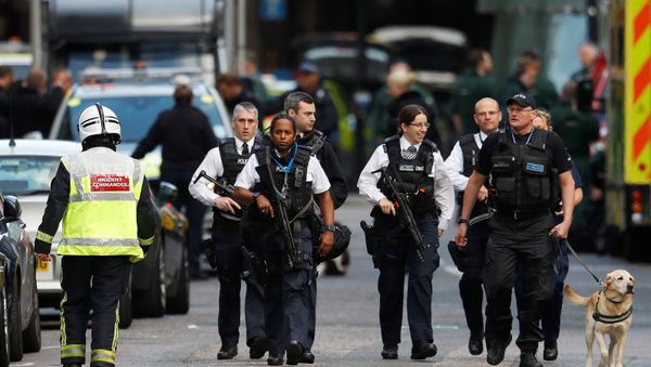 Armed police officers walk outside Borough Market after an attack left 6 people dead and dozens injured in London, Britain, June 4, 2017 Armed police officers walk outside Borough Market after an attack left 6 people dead and dozens injured in London, Britain, June 4, 2017 - Sputnik International