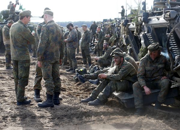 German army soldiers rest after NATO enchanced Forward Presence Battle Group Lithuania exercise in Pabrade military training field, Lithuania, May 17, 2017 German army soldiers rest after NATO enchanced Forward Presence Battle Group Lithuania exercise in Pabrade military training field, Lithuania, May 17, 2017 - Sputnik International