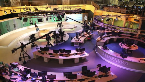 Staff members of Al-Jazeera International work at the news studio in Doha, Qatar (File) Staff members of Al-Jazeera International work at the news studio in Doha, Qatar (File) - Sputnik International