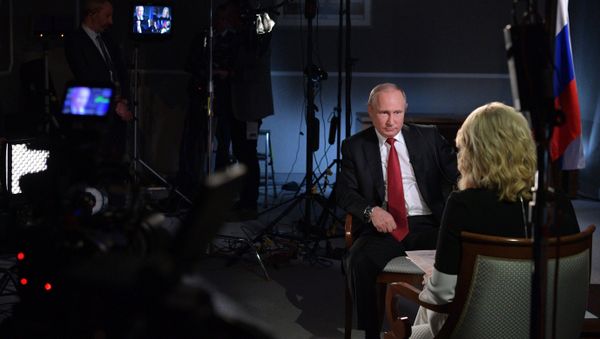 June 3, 2017. Russian President Vladimir Putin and CNN anchor Megyn Kelly during an interview on the sidelines of the 2017 St. Petersburg International Economic Forum - Sputnik International