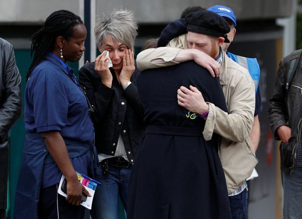 People react in front of floral tributes on the south side of London Bridge near Borough Market after an attack left 7 people dead and dozens of injured in London, Britain, June 5, 2017. People react in front of floral tributes on the south side of London Bridge near Borough Market after an attack left 7 people dead and dozens of injured in London, Britain, June 5, 2017. - Sputnik International