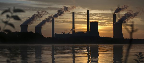 The coal-fired Plant Scherer, one of the nation's top carbon dioxide emitters, stands in the distance in Juliette, Ga., Saturday, June, 3, 2017 The coal-fired Plant Scherer, one of the nation's top carbon dioxide emitters, stands in the distance in Juliette, Ga., Saturday, June, 3, 2017 - Sputnik International