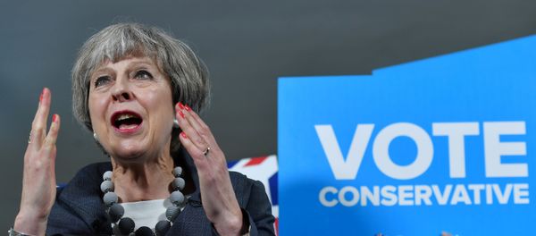 Britain's Prime Minister Theresa May delivers a speech during an election campaign visit to Langton Rugby Club in Stoke-on-Trent, June 6, 2017. Britain's Prime Minister Theresa May delivers a speech during an election campaign visit to Langton Rugby Club in Stoke-on-Trent, June 6, 2017. - Sputnik International