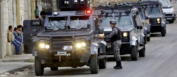 Jordanian security forces secure Hakama street during a raid in downtown Irbid, north of Amman, Jordan, Wednesday, March 2, 2016 Jordanian security forces secure Hakama street during a raid in downtown Irbid, north of Amman, Jordan, Wednesday, March 2, 2016 - Sputnik International