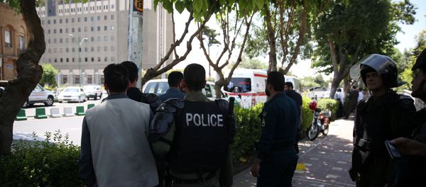 Iranian police stand near the parliament's building during a gunmen attack in central Tehran, Iran, June 7, 2017 Iranian police stand near the parliament's building during a gunmen attack in central Tehran, Iran, June 7, 2017 - Sputnik International