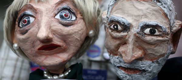 Puppets of Conservative Party leader Theresa May and Labour Party leader Jeremy Corbyn are seen during a protest against the BBC's broadcast restrictions on the Captain Ska song Liar Liar outside Broadcasting House in London, Britain June 2, 2017. - Sputnik International