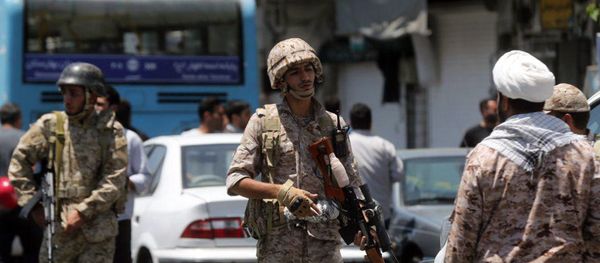 Members of the Iranian Revolutionary Guard secure the area outside the Iranian parliament during an attack on the complex in the capital Tehran on June 7, 2017 Members of the Iranian Revolutionary Guard secure the area outside the Iranian parliament during an attack on the complex in the capital Tehran on June 7, 2017 - Sputnik International