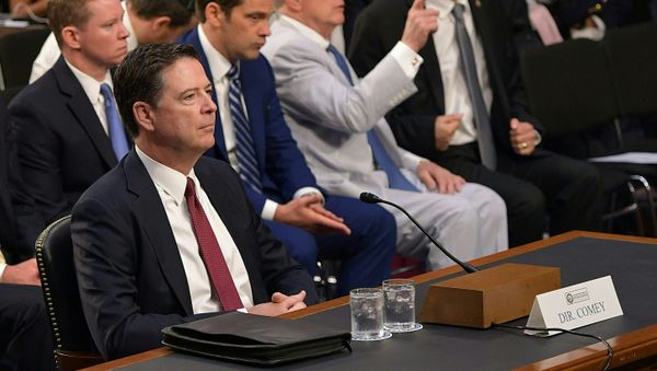 Former FBI Director James Comey arrives to testify during a US Senate Select Committee on Intelligence hearing on Capitol Hill in Washington,DC, June 8, 2017. - Sputnik International