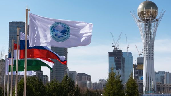 The flag of the Shanghai Cooperation Organization and flags of the SCO member states in Astana The flag of the Shanghai Cooperation Organization and flags of the SCO member states in Astana - Sputnik International