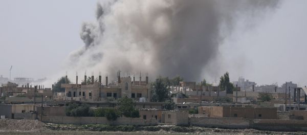 Smoke rises from the Raqqa province Syria. (File) - Sputnik International