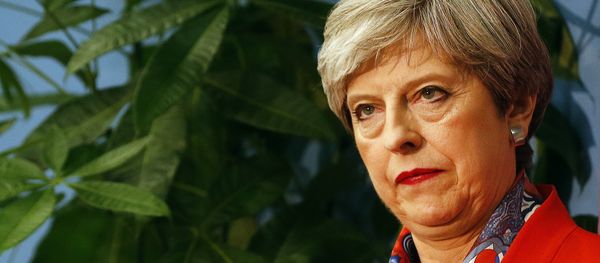 Britain's Prime Minister Theresa May listens as the declaration at her constituency is made for in the general election in Maidenhead, England, Friday, June 9, 2017. Britain's Prime Minister Theresa May listens as the declaration at her constituency is made for in the general election in Maidenhead, England, Friday, June 9, 2017. - Sputnik International