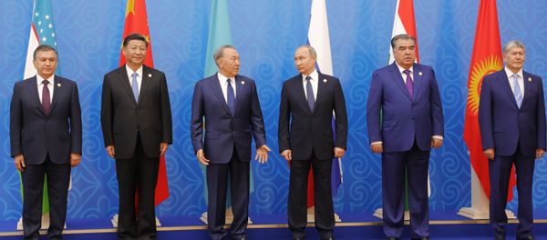 June 9, 2017. President Vladimir Putin poses for photographs with the participants of the meeting of the Council of Heads of State of the Shanghai Cooperation Organization (SCO). From left: President of Uzbekistan Shavkat Mirziyoyev, President of China Xi Jinping, President of Kazakhstan Nursultan Nazarbayev. From right: President of Kyrgyzstan Almazbek Atambayev, President of Tajikistan Emomali Rahmon. June 9, 2017. President Vladimir Putin poses for photographs with the participants of the meeting of the Council of Heads of State of the Shanghai Cooperation Organization (SCO). From left: President of Uzbekistan Shavkat Mirziyoyev, President of China Xi Jinping, President of Kazakhstan Nursultan Nazarbayev. From right: President of Kyrgyzstan Almazbek Atambayev, President of Tajikistan Emomali Rahmon. - Sputnik International