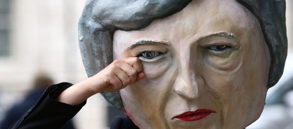 Protestor wearing a Theresa May mask poses outside Downing Street after Britain's election in London, Britain June 9, 2017. Protestor wearing a Theresa May mask poses outside Downing Street after Britain's election in London, Britain June 9, 2017. - Sputnik International
