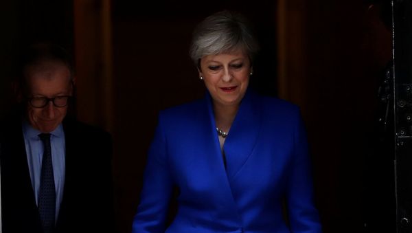 Britain's Primer Minister Theresa May leaves Downing Street on her way to Buckingham Palace after Britain's election in London, Britain Britain's Primer Minister Theresa May leaves Downing Street on her way to Buckingham Palace after Britain's election in London, Britain - Sputnik International